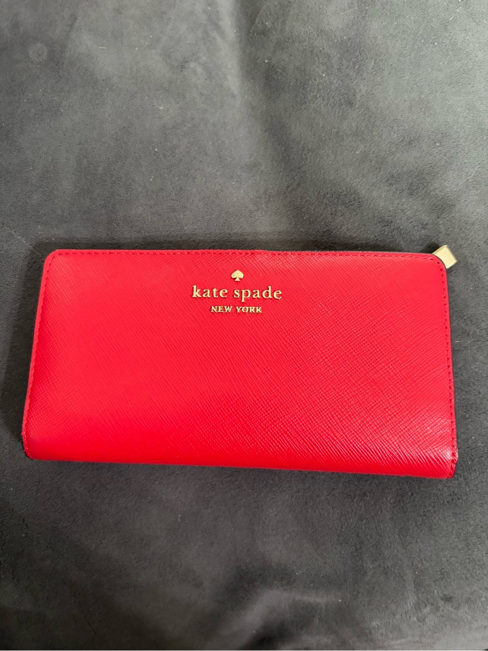 kate spade red ziparound wallet with gold logo